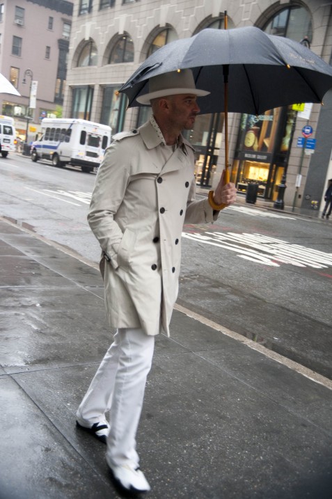 Man in White, Rainy Day Wear Man in White, Rainy Day Wear