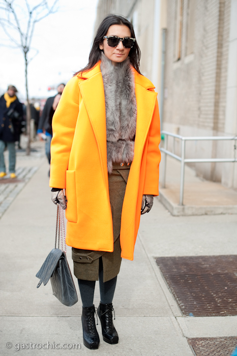 Liz Cabral in an Orange Coat, Outside Derek Lam
